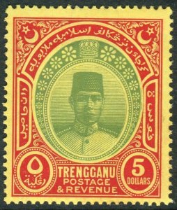 TRENGGANU-1938 $5 Green & Red/Yellow.  A mounted mint example Sg 44