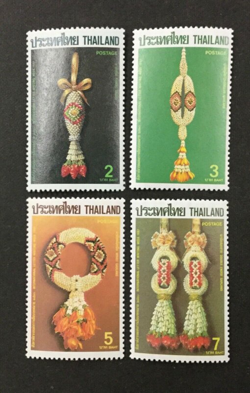 THAILAND #1192-1195, 1987 set of 4 VF MNH. Floral Garlands. CV $2.50. (BJS)