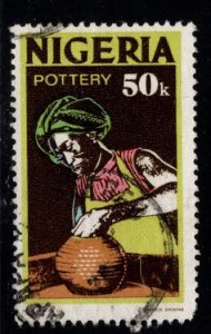 Nigeria Scott 305a Used  Potter stamp with dark brown background