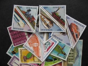 Scrap pile of 45 SURINAME. Duplicates, mixed condition,what lurks?