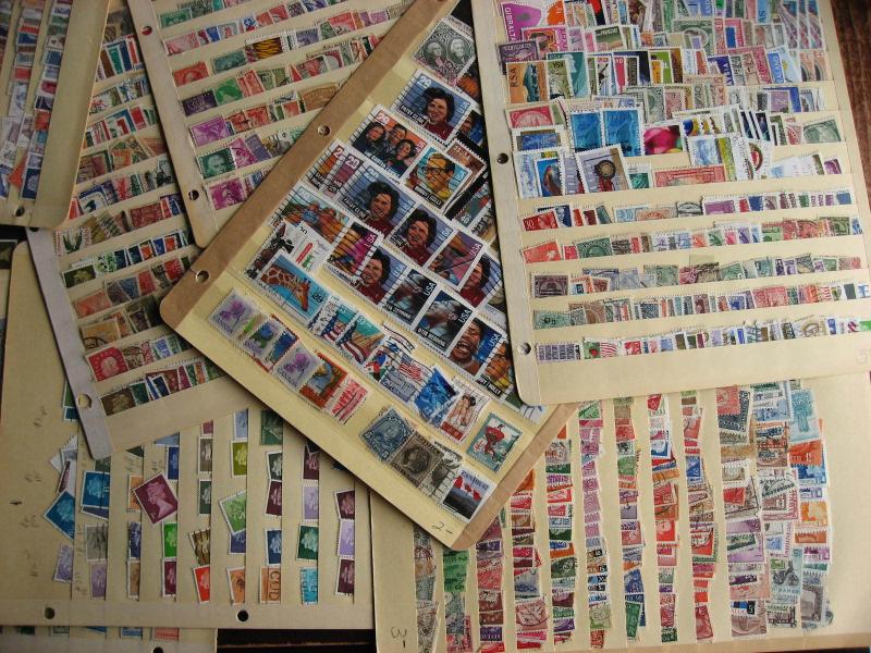 WW boxlot stamps haphazardly stuck into stock pages,no apparent order,what lurks