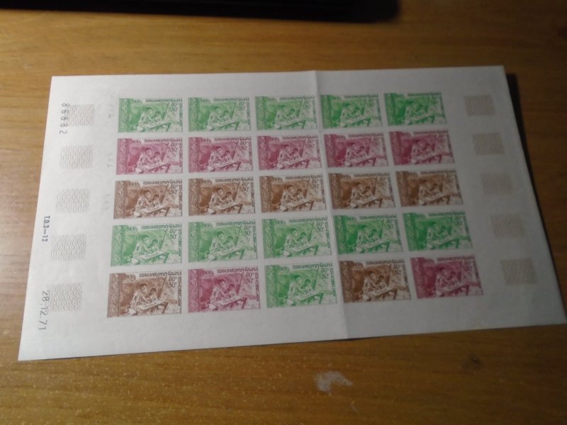 Laos  #  226   MNH  complete sheet  imperf  fold