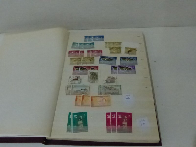 Dealers stock of Yemen stamps in Brown stockbook 