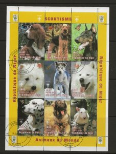 Thematic stamps Dogs. Niger 1998 sheet of 9 Dogs/Scouts used