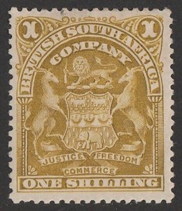 RHODESIA 1898 Arms 1/- deep olive-bistre. Rare shade.