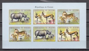 Guinea, 1999 issue. African Fauna with Scout logo. IMPERF s/sheet.. ^