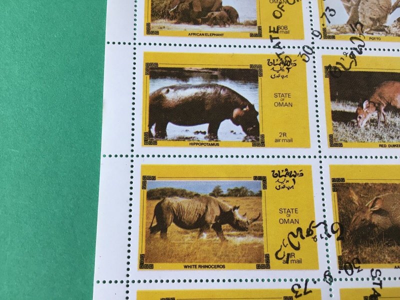 State of Oman Elephant Rhino & Animals in the wild cancelled stamps sheet  55459