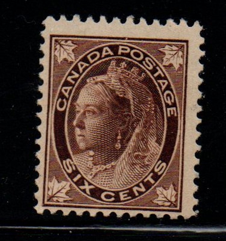 Canada Sc 71 1897 6 c brown Victoria Maple Leaf stamp mint