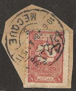 Saudi Arabia 100, used, 1926.  On piece, with full 1928 Mecca cancel. (s402).