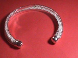 CHINA-BEAUTIFULTWIST NET HOLLOW STYLE BANGLE BRACELET IDEAL FOR GIFT . PLEASE WA