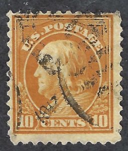 United States #510  10¢ Franklin.  Orange yellow. Good centering. Used.