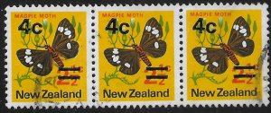 New Zealand #480  used strip of three. overprint. 4c.  Magpie Moth.  Nice