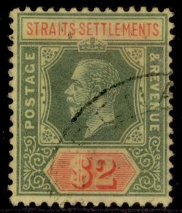 MALAYSIA - Straits Settlements GV SG211, $2 green & red/yellow, FU. Cat £55.