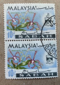 Sabah 1965 10c Orchid, used pair. See note. Scott 21, CV $0.50. SG 428