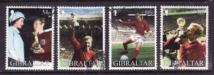 Gibraltar-Sc#905-8-used set-British Soccer-Sports-2002-small hinge remnant on ba