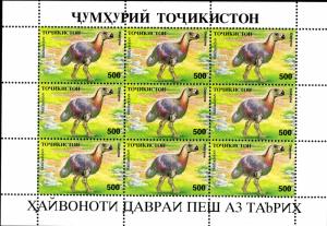 TAJIKISTAN  53-60 SHEETS OF 9  MNH SCV $60.00 BIN $30.00  PREHISTORIC ANIMALS