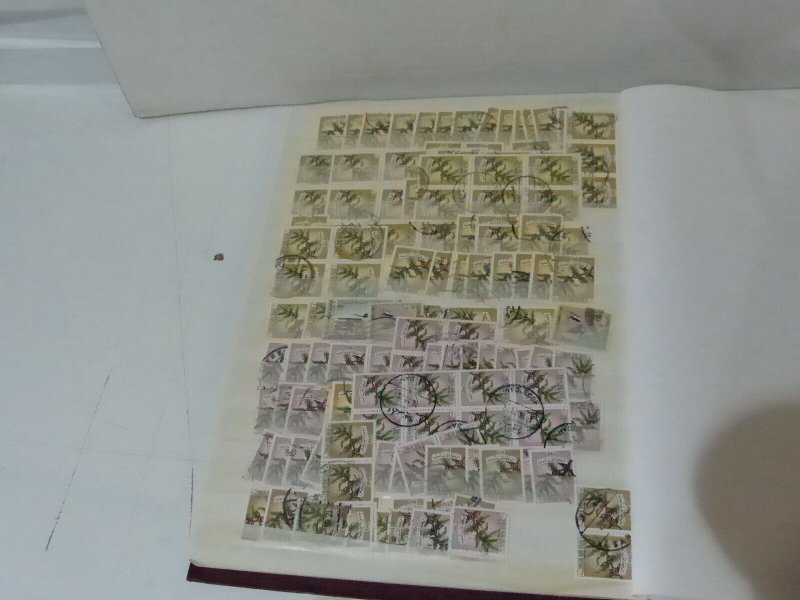 Dealers stock of Yemen stamps in Brown stockbook 