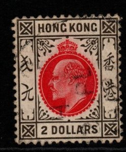 HONG KONG SG99 1910 $2 CARMINE-RED & BLACK FINE USED