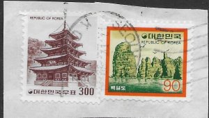 Korea #1100 Pagoda.  used stamps on cut corner with post mark.