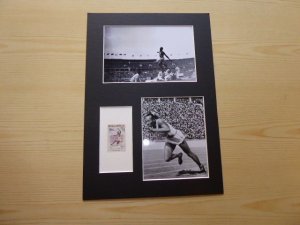 Jesse Owens Olympic Legend Guinea stamp and mounted photographs mount size A4