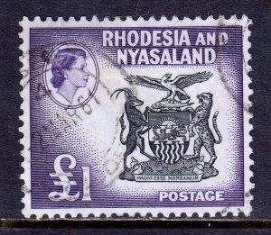 RHODESIA & NYASALAND — SCOTT 171 — 1959 £1 COAT OF ARMS — USED — SCV $67