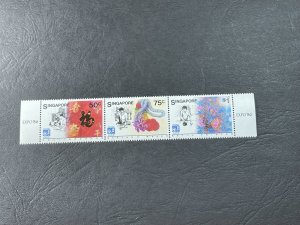 SINGAPORE # 486--MINT NEVER/HINGED----COMPLETE SET/STRIP OF 3-----1986