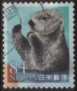 Japan 4599f (used) 84y marine life: otter facing left, paws raised (6/22/2022)