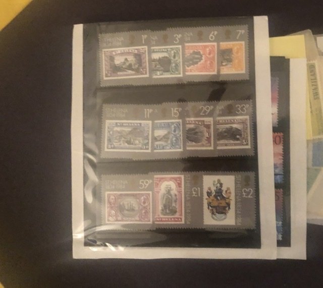 Lot of International Stamps In Glass Scenes Some Have Nice Value