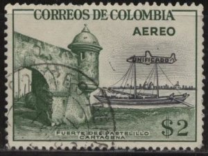 Colombia C343 (used) 2p Pastelillo Fort, Cartagena, airplane ovpt (1959)