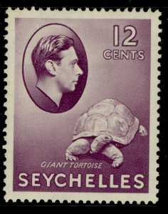 SEYCHELLES GVI SG139, 12c reddish violet, LH MINT. Cat £50.