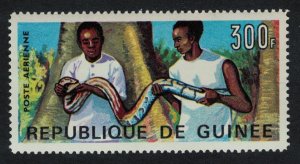 Guinea Attendants handling viper Snake 300f KEY VALUE 1967 MNH SG#601