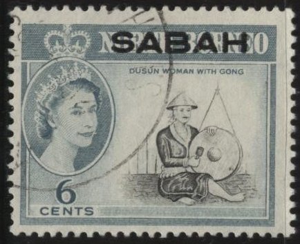 Malaysia: Sabah 4 (used) 6c Duan woman with gong, bluish grn & slate (1964)