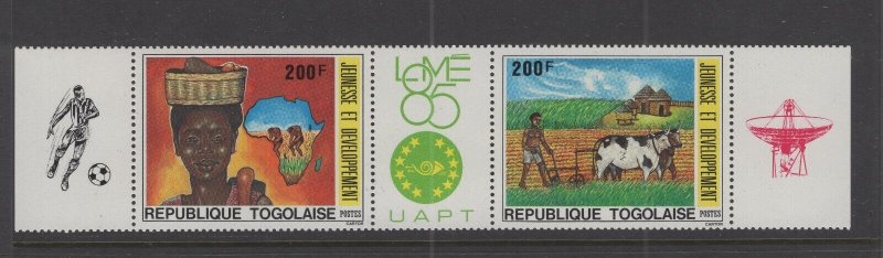 Togo #1317a (1985 Development pair with gutter)  VFMNH  CV $4.00