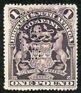 British South Africa SG90a One Pound Blackish Purple Perf 14 Perfin Used