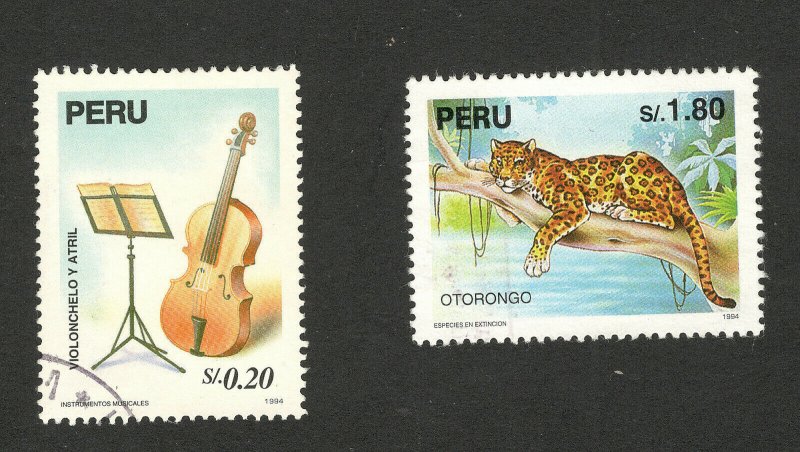 PERU-TWO USED STAMPS-FAUNA-WILD ANIMALS-VIOLIN - 1995.