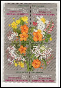 MARSHALL ISLANDS - 1986 FLOWERS / CHRISTMAS SE-TENANT BLOCK 4V - MINT NH