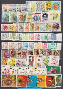 J44161 JL Stamps worldwide flowers lot with sets pitcairn, palau paraguay more