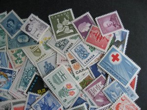 Canada 100 different MNH mostly older stamps, check this group out!