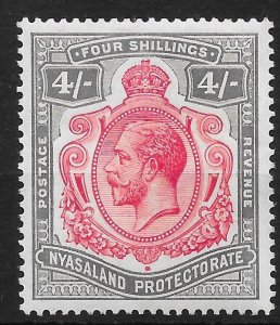 NYASALAND SG111 1927 4/= CARMINE & BLACK MTD MINT