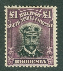 SG 242 Rhodesia 1913-17. £1 black & reddish purple. A pristine very lightly...