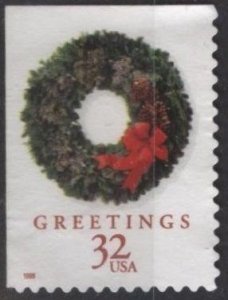 US 3249 (used on paper) 32¢ Christmas: evergreen wreath (1998)