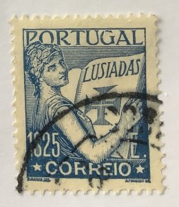 Portugal 1931-38 Scott 514 used- 1.25e Portugal holding a volume of the Lusiadas