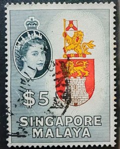 A used postage stamp of Singapore and Malaya from 1955. It depicts Queen...