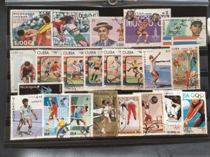 The World of Sports  mixed old postage stamps Ref 61396