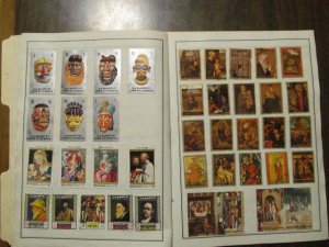 uncatalogued collection remainder on pages Umm al Qiwain about 417 stamps