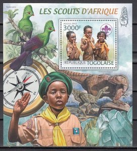 Togo, 2012 issue. African Boy Scouts s/sheet. Dinosaur in Selvage. ^