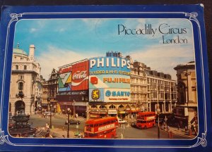 United Kingdom. Postcard. Piccadilly Circus in London, a busy transport an...