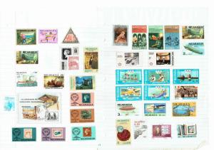 #764 Nicaragua collection hinged on 28 leaves +5 cards