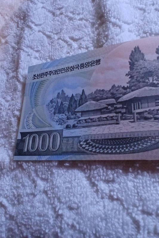 NORTH KOREA.2006.BANKNOTE OF 1000 WON.# OO.871495.UNCIRCULATED.