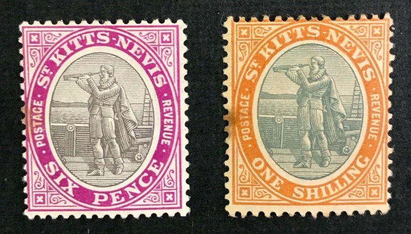 St. Kitts Nevis #19-20 small stain on each, left side center - Hinged